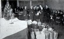 Distribution of gifts to the needy highlighted the Christmas program in 1940.
